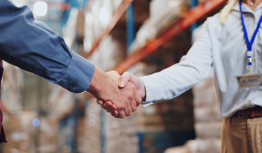 handshake between logistics and marketing agency