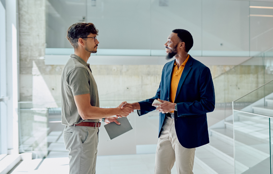 two men shaking hands to show that B2B lead nurturing starts with trust and ends with partnership